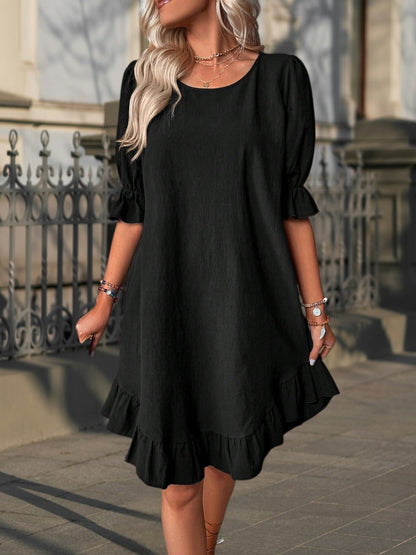 CM | Vestido midi de mujer atemporal confeccionado en material de alta calidad con un corte elegante y mangas cortas