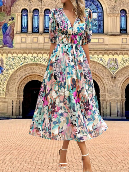 CM | Vestido midi floral con mangas abullonadas