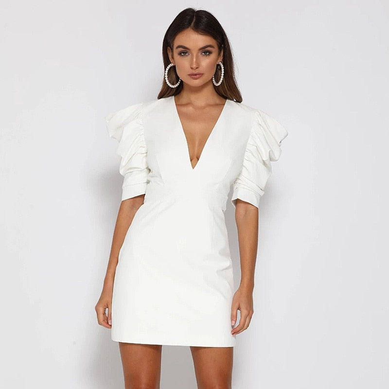 CM | Vestido corto con mangas abullonadas estructuradas