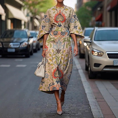 CM | Elegante vestido largo con mangas murciélago