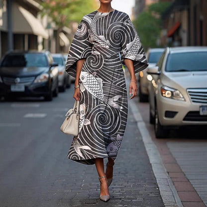 CM | Elegante vestido largo con mangas murciélago