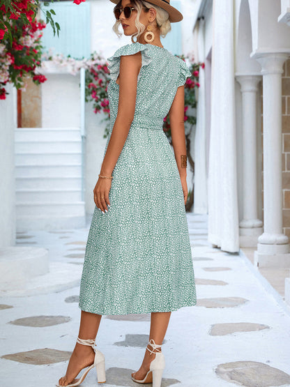 CM | Vestido midi estampado con mangas volantes anudadas