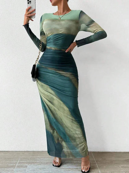 CM | Maxi vestido con estampado floral, ceñido al cuerpo