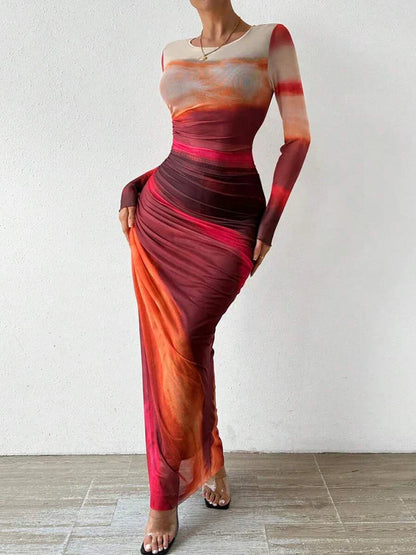 CM | Maxi vestido con estampado floral, ceñido al cuerpo