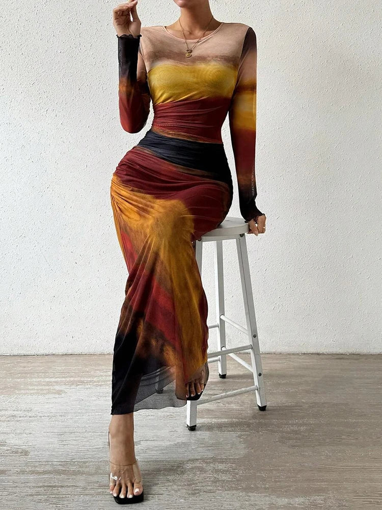 CM | Maxi vestido con estampado floral, ceñido al cuerpo