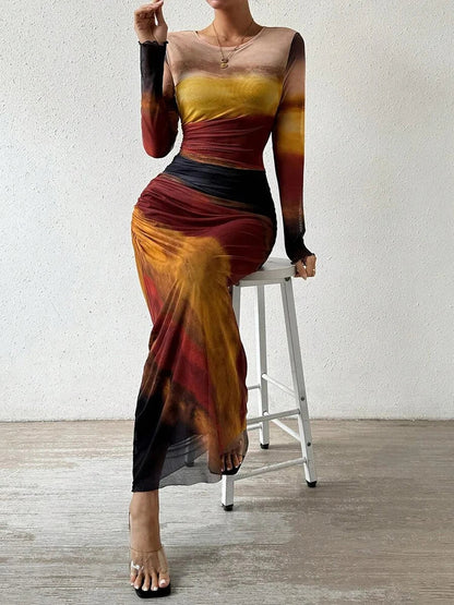 CM | Maxi vestido con estampado floral, ceñido al cuerpo