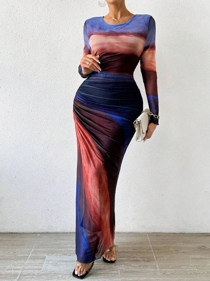 CM | Maxi vestido con estampado floral, ceñido al cuerpo