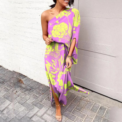 CM | Vestido largo asimétrico con estampado floral