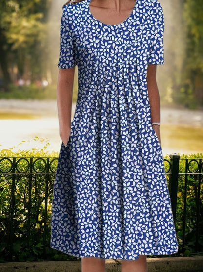 CM | Vestido midi veraniego con escote redondo, manga corta y corte holgado