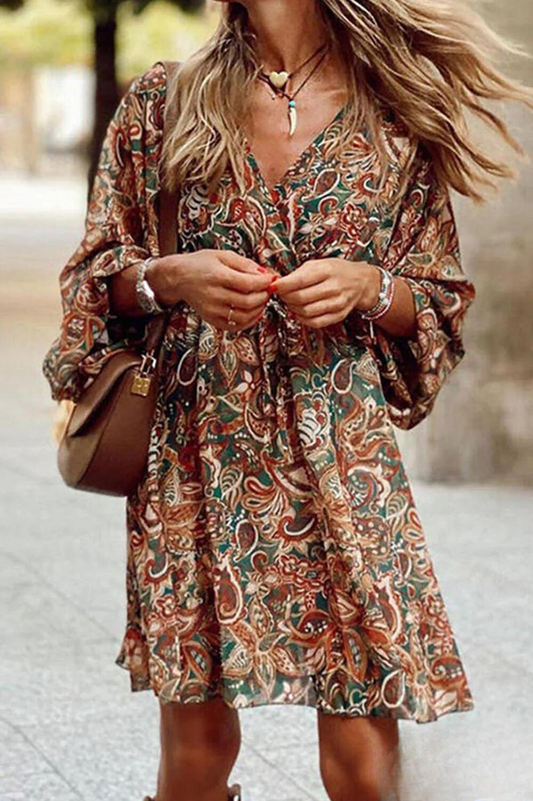CM | Mini vestido con escote en V y estampado floral