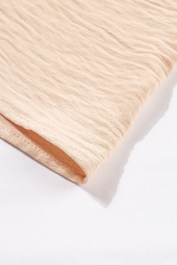 CM | Vestido cruzado en color avena con corpiño sin espalda y maxi vestido con capas