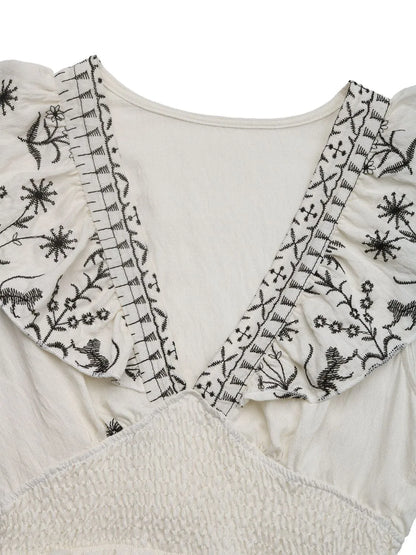 CM | Minivestido fruncido con mangas de volantes