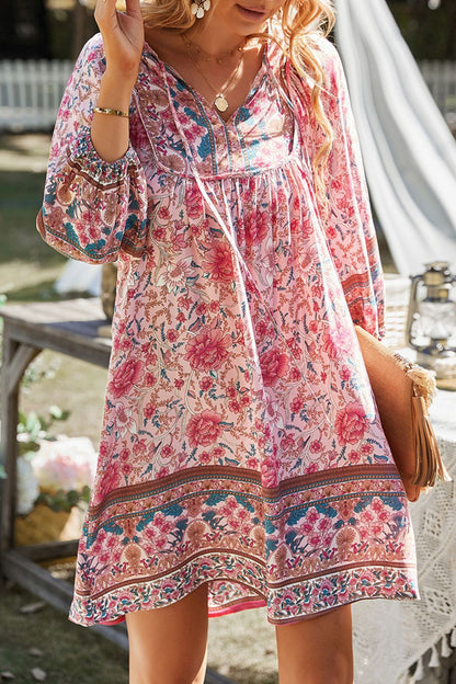 CM | Devine Minivestido estampado con escote anudado