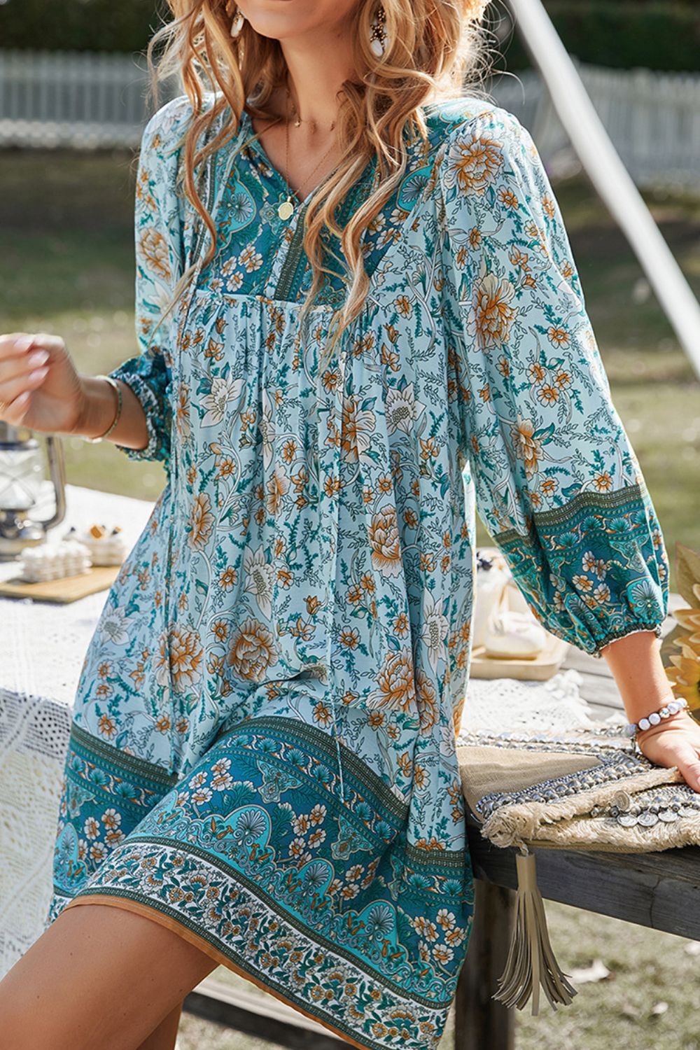 CM | Devine Minivestido estampado con escote anudado