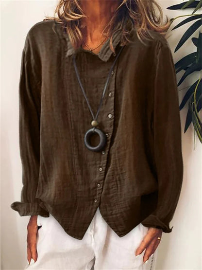 CM | Blusa asimétrica abotonada