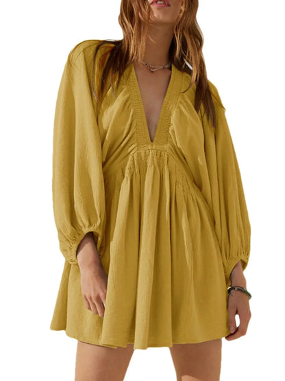 CM | Minivestido texturizado con escote en V