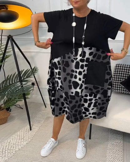 CM | Elegante vestido midi de manga corta con estampado de leopardo