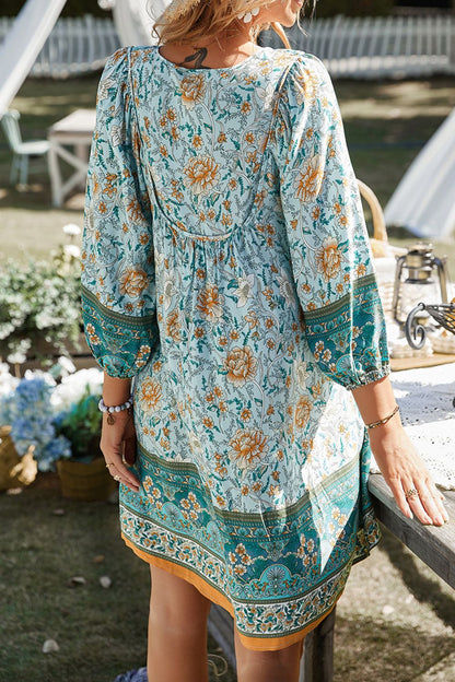 CM | Devine Minivestido estampado con escote anudado