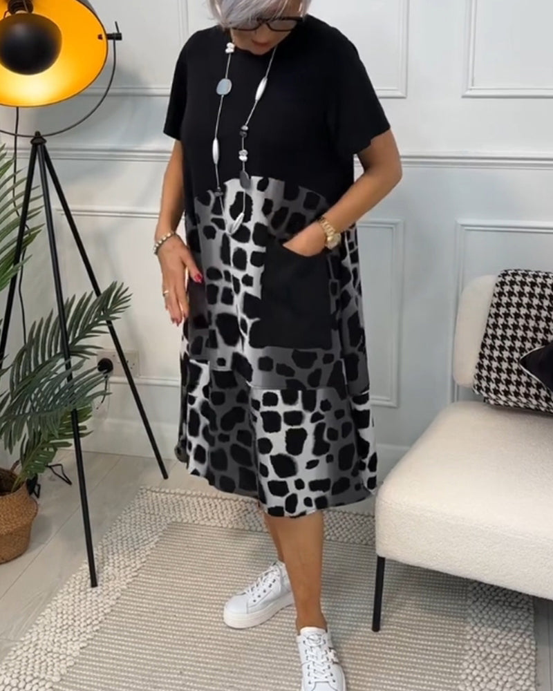 CM | Elegante vestido midi de manga corta con estampado de leopardo