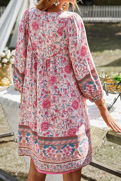 CM | Devine Minivestido estampado con escote anudado