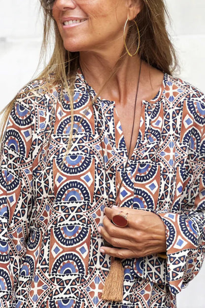 CM | Vestido largo con cuello en V y abertura estampada