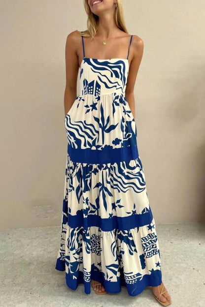 CM | Elegante maxi vestido con volantes y estampado floral