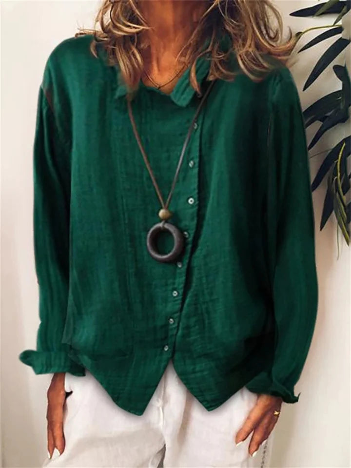 CM | Blusa asimétrica abotonada