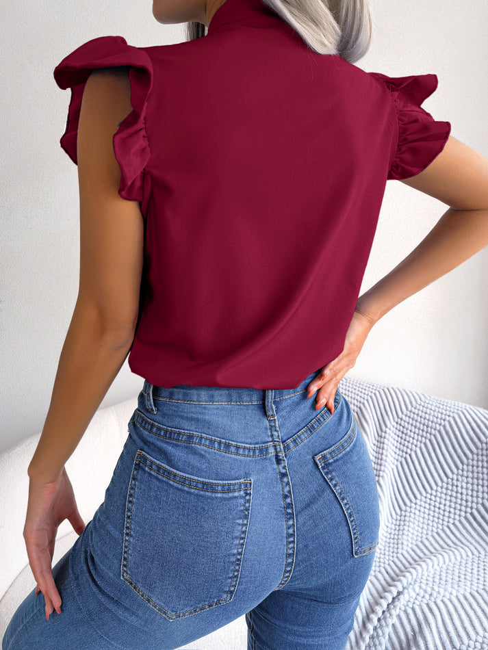 CM | Blusa sin mangas con cuello de lazo y mangas con flecos