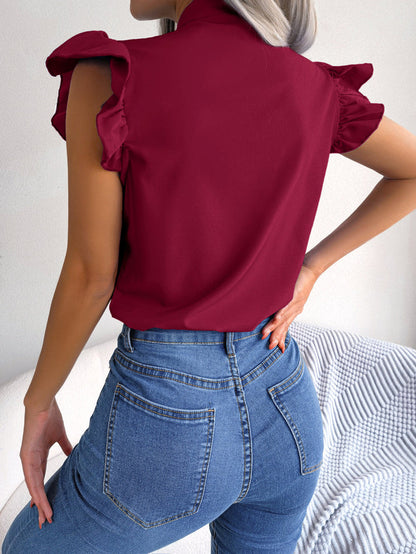 CM | Blusa sin mangas con cuello de lazo y mangas con flecos