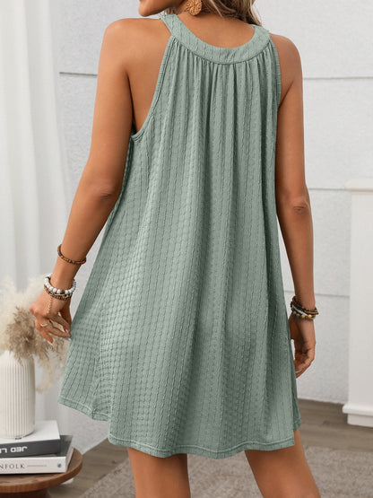 CM | Minivestido texturizado con escote griego
