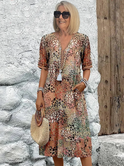 CM | Vibrante vestido midi con bolsillos para mujer