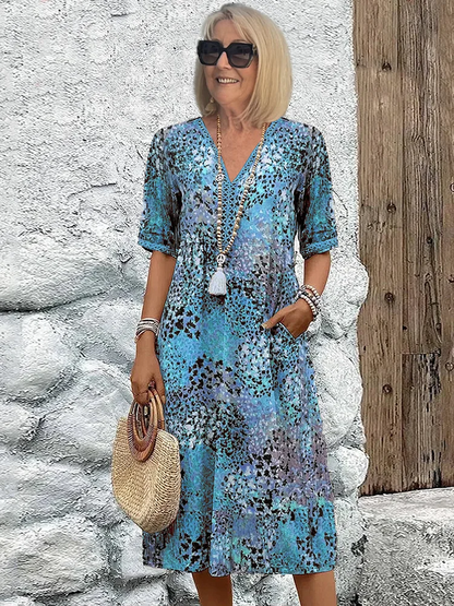CM | Vibrante vestido midi con bolsillos para mujer