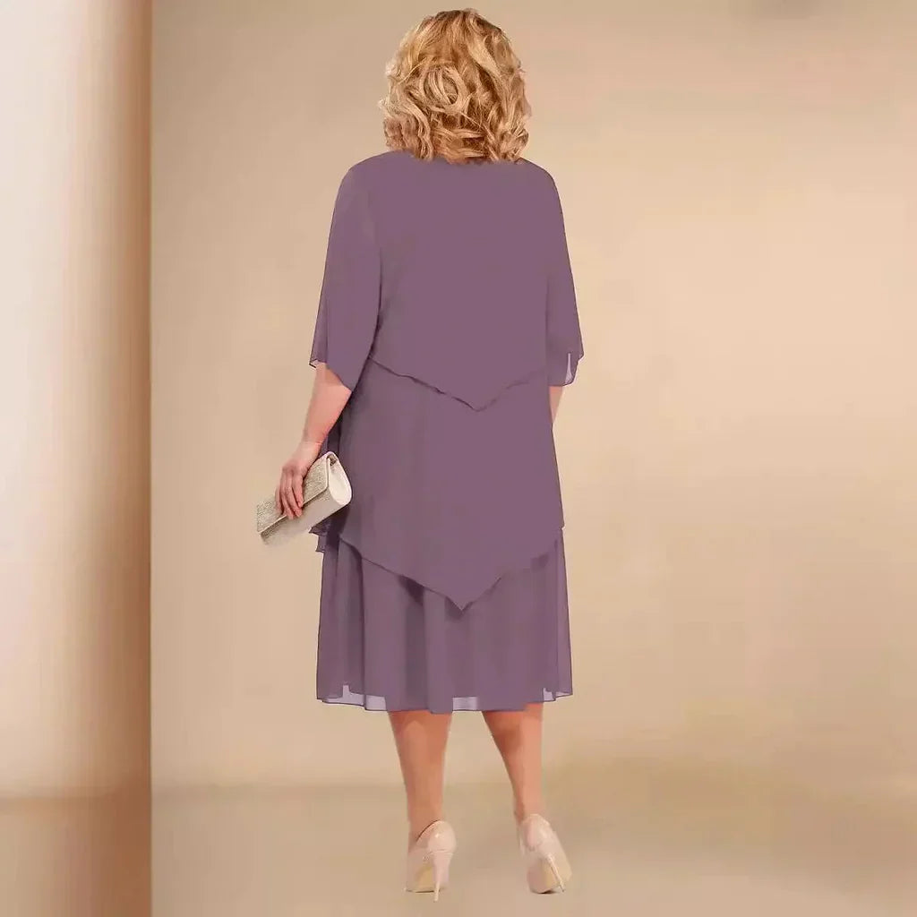 CM | VESTIDO MIDI CON DOBLADILLO EN CAPAS.