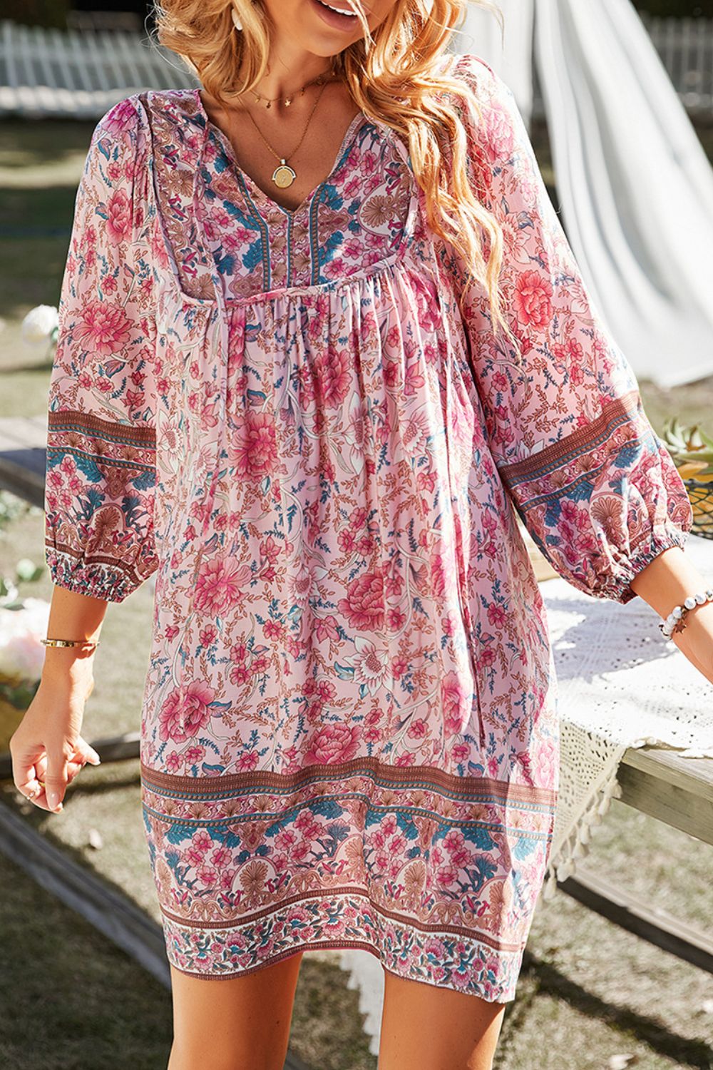 CM | Devine Minivestido estampado con escote anudado