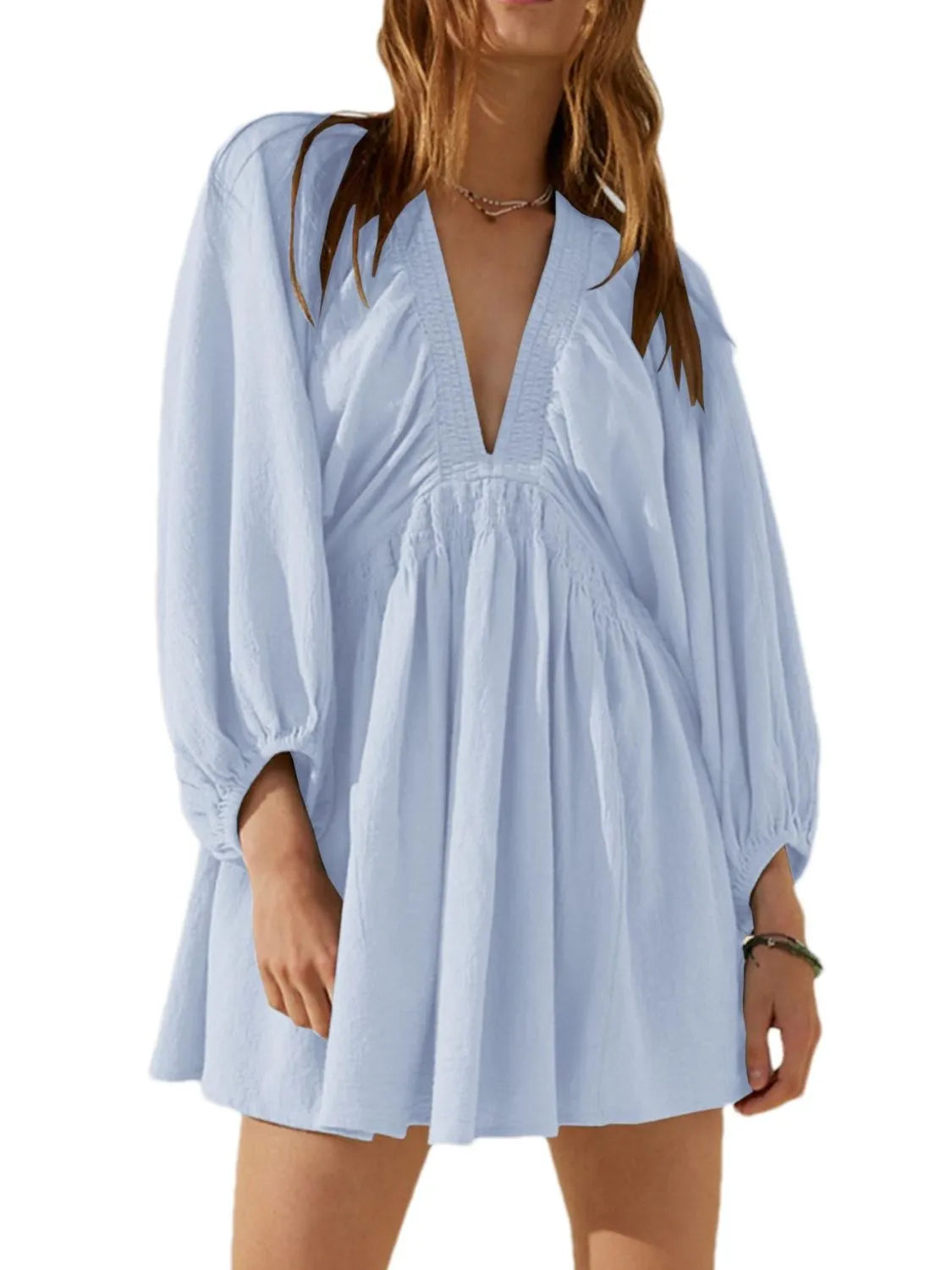 CM | Minivestido texturizado con escote en V