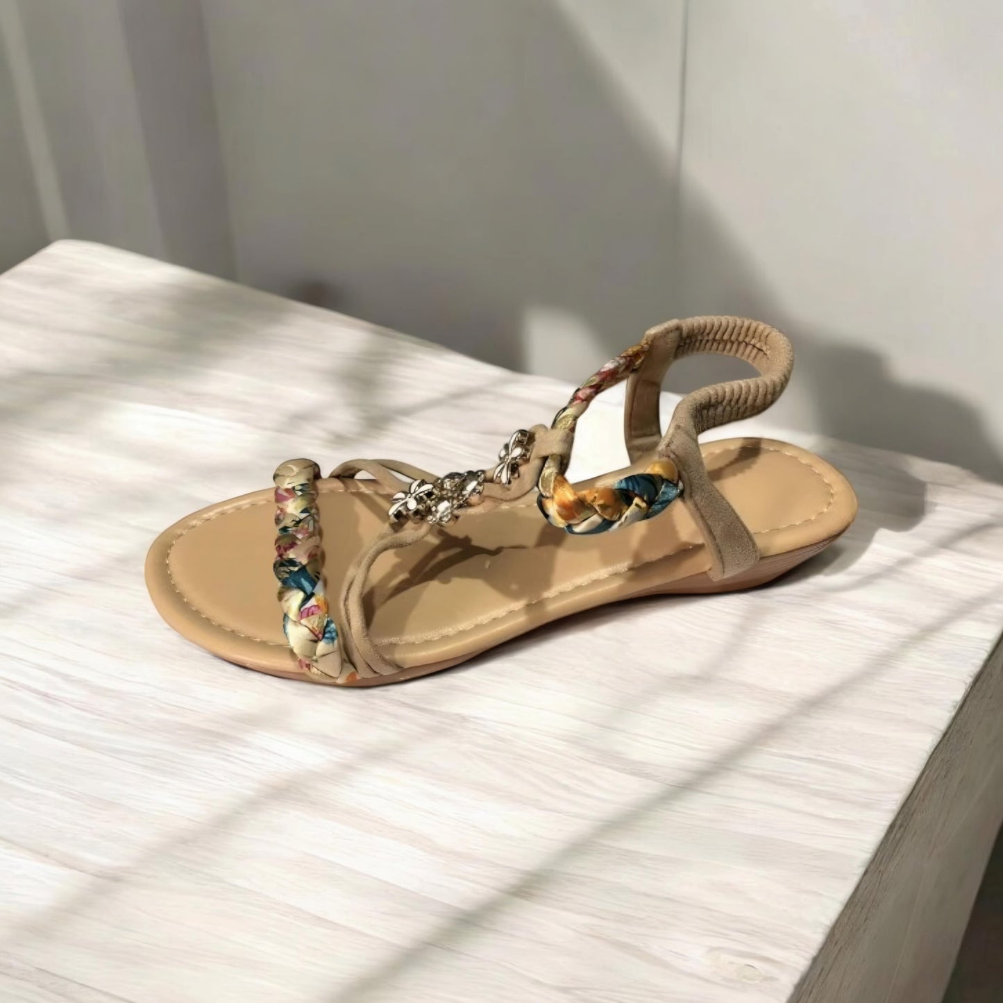 CM | Sandalias planas trenzadas