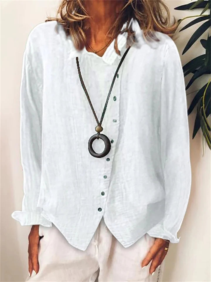 CM | Blusa asimétrica abotonada