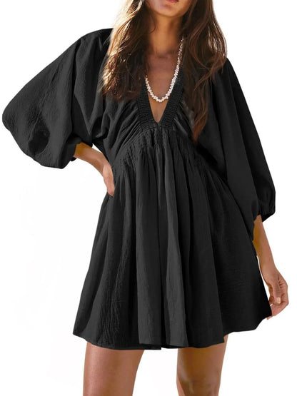 CM | Minivestido texturizado con escote en V