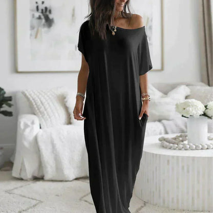 CM | Maxivestido de mujer - Material suave y ligero - Mangas cortas - Corte relajado - Escote redondo - Abertura lateral - Bolsillos