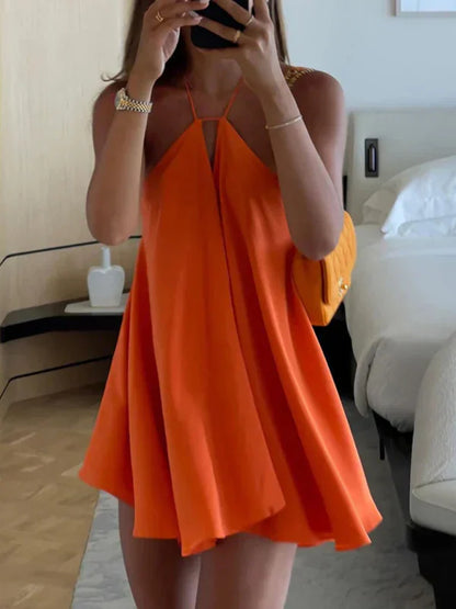 CM | Mini vestido escote halter con tirantes y espalda vista