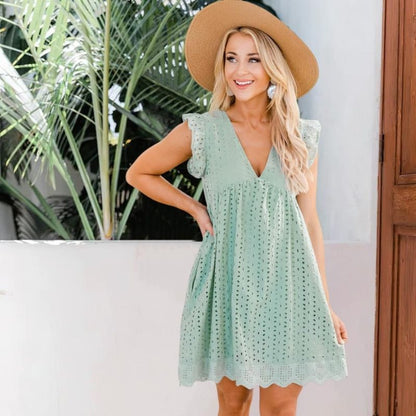 CM | Delicado mini vestido con ojales
