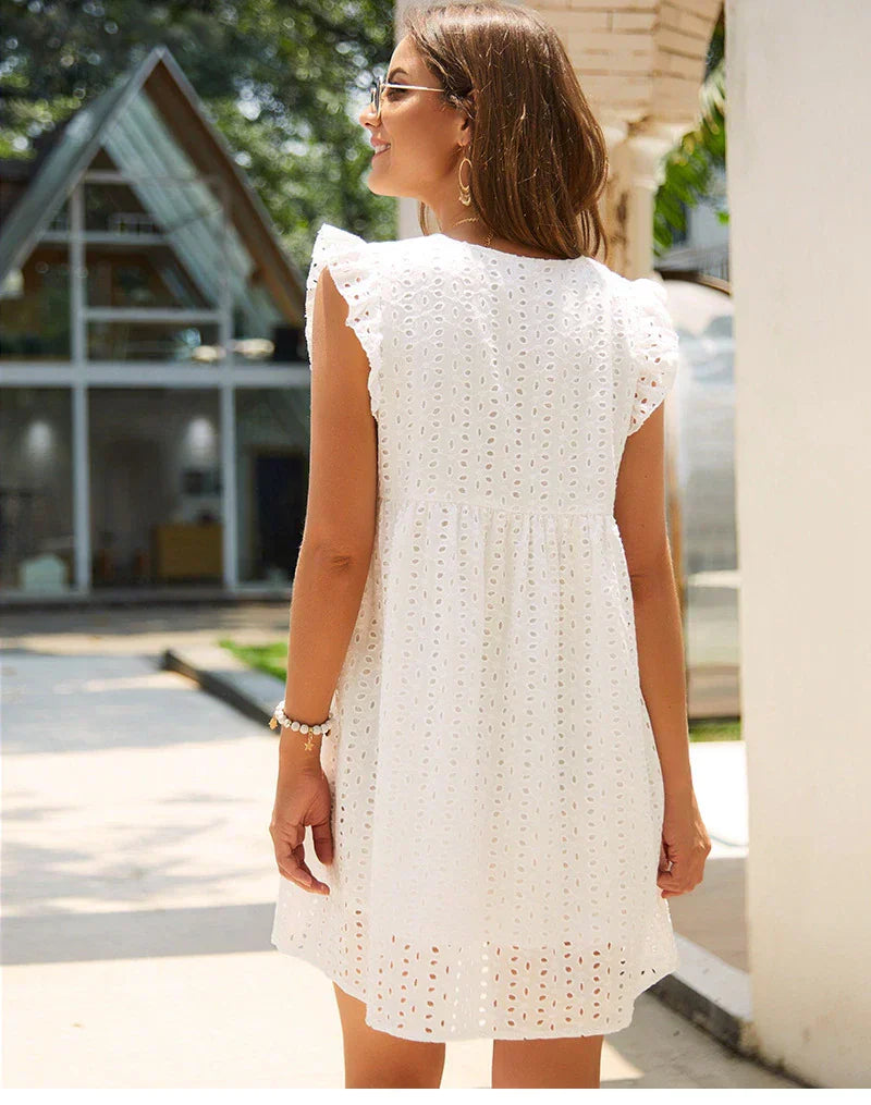 CM | Vestido corto bordado con volantes