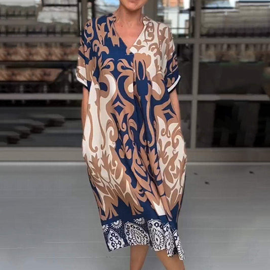 CM | Vestido midi ajustado con elegante estampado
