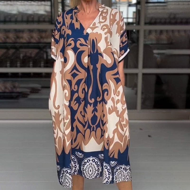 CM | Vestido midi ajustado con elegante estampado