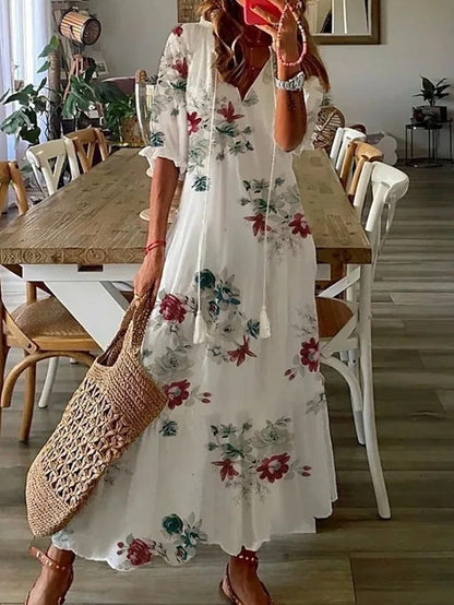 CM | Vestido largo fluido con estampado étnico