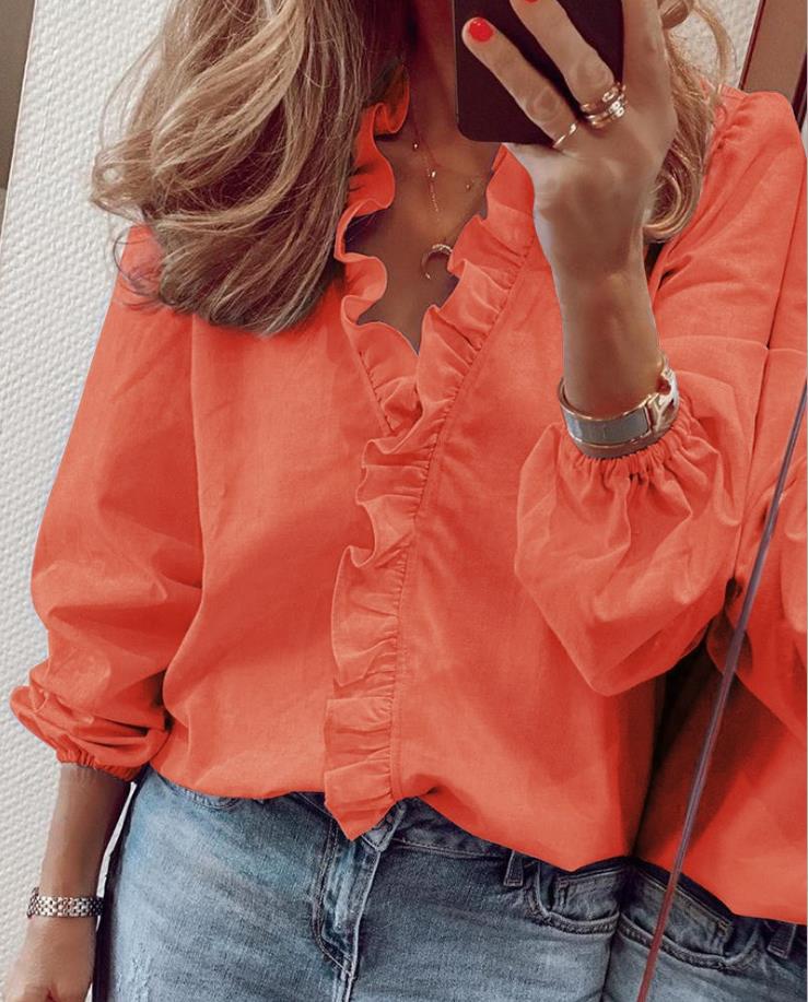 CM | Blusa Wolf con volantes y escote en V